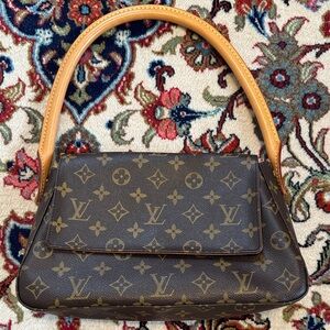 Louis Vuitton Monogram Canvas Shoulder Bag with Vachetta Strap looping style